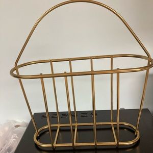 Gold tone metal magazine rack